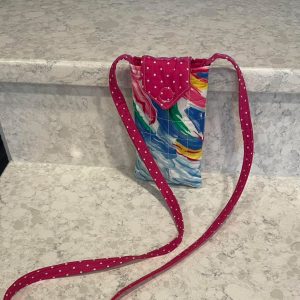 Phone pouch-hot pink polka dots with multicolored floral